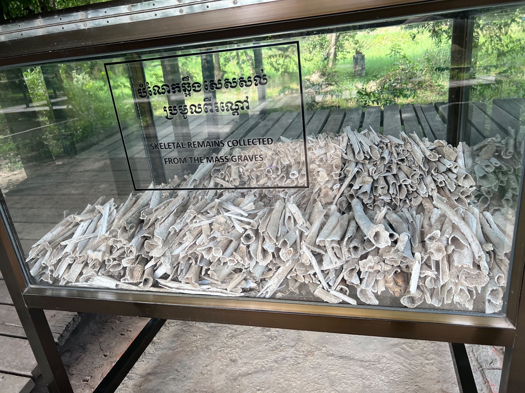 To this day, after the rainy season, human remains emerge from the grounds. They are being collected and buried.