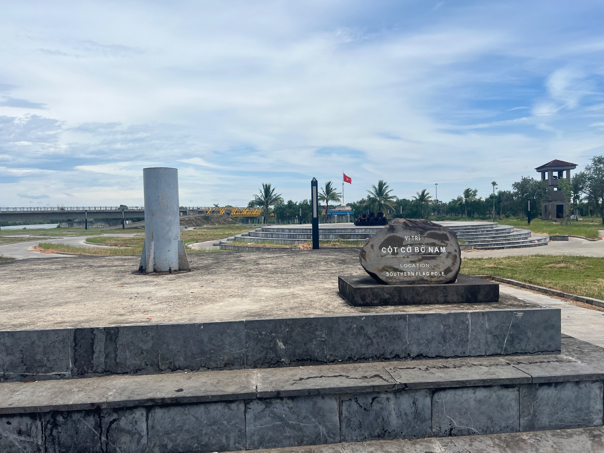 The stump of the southern flag pole with Northern (and current) flag in the background)
