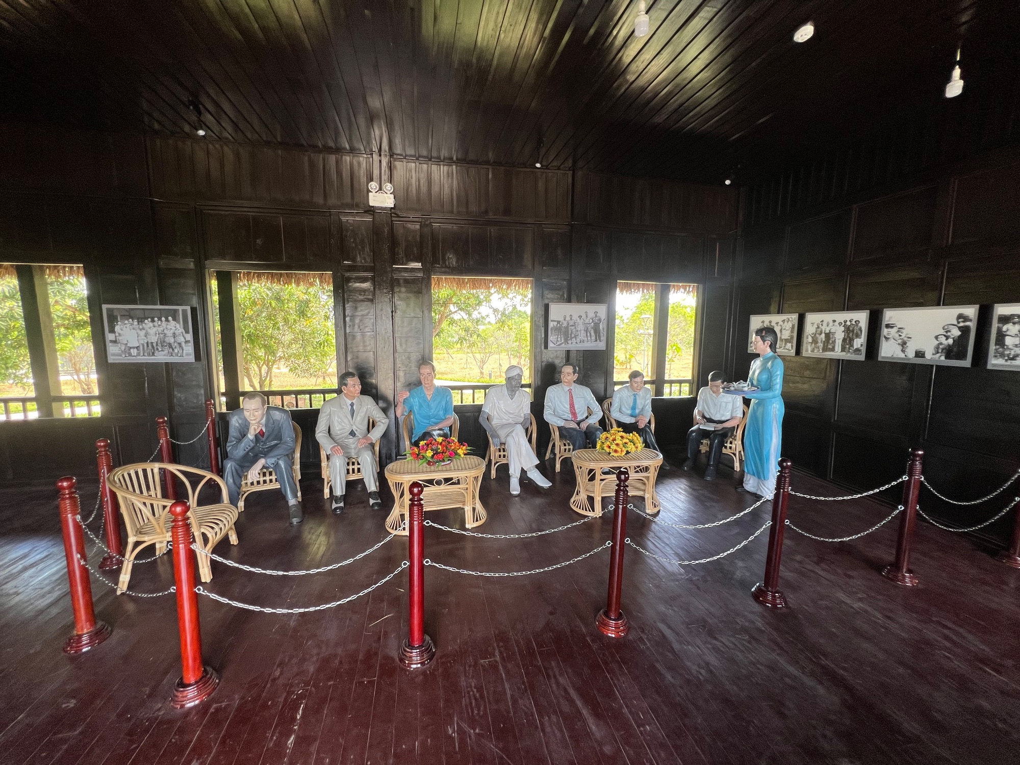 The empty chair is presumably for Ho Chi Minh who passed in 1969, well before the conclusion of the war.